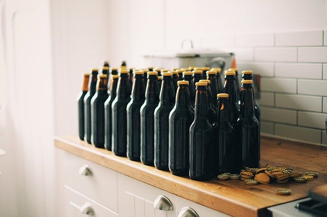 Beer bottles getting ready to be filled for homebrewing