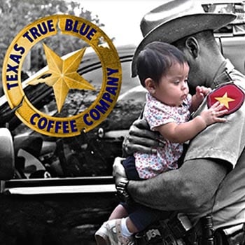 Texas true blue coffee police officer with a child